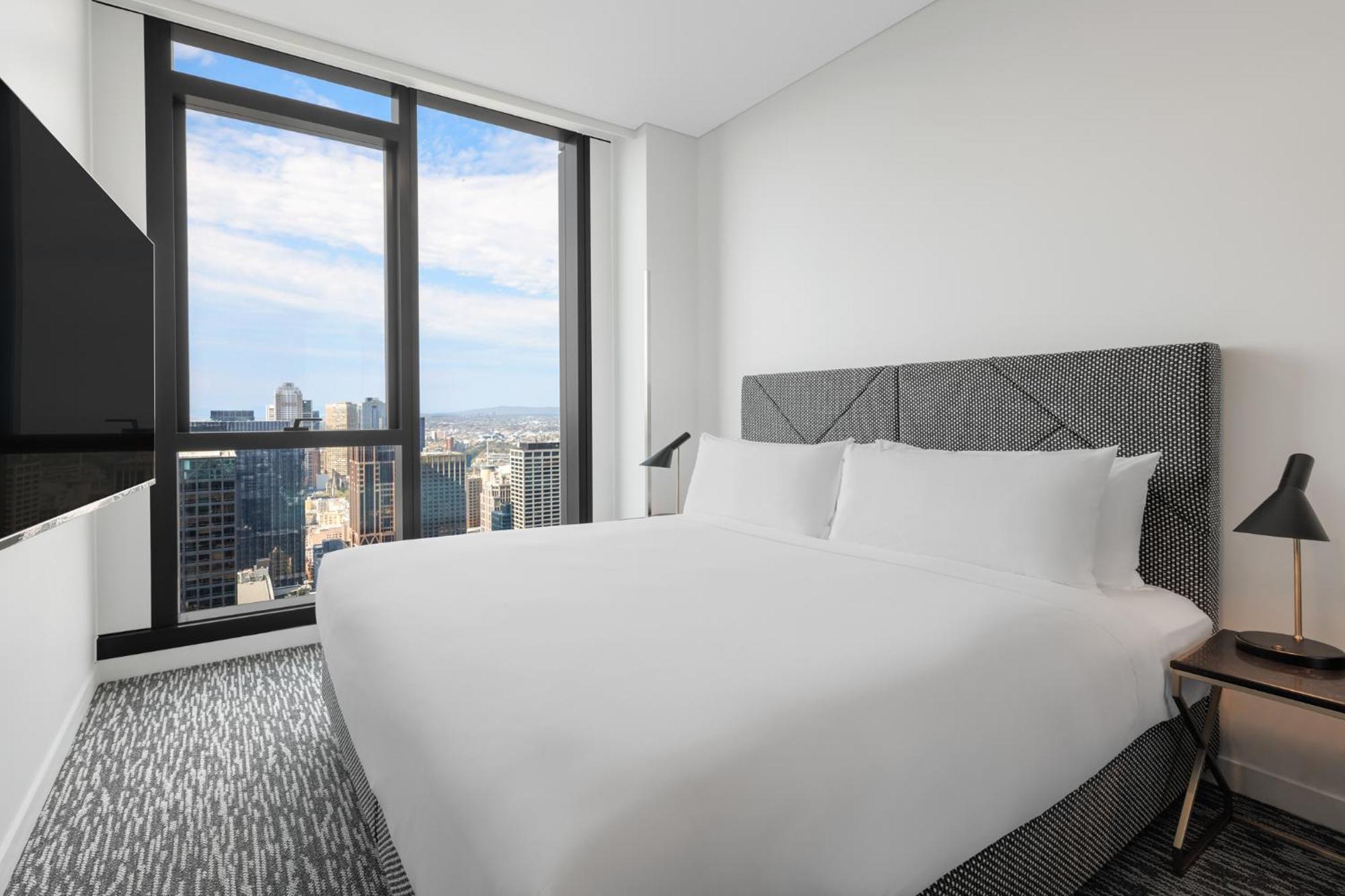Meriton Suites Melbourne Exterior foto A bedroom at the hotel