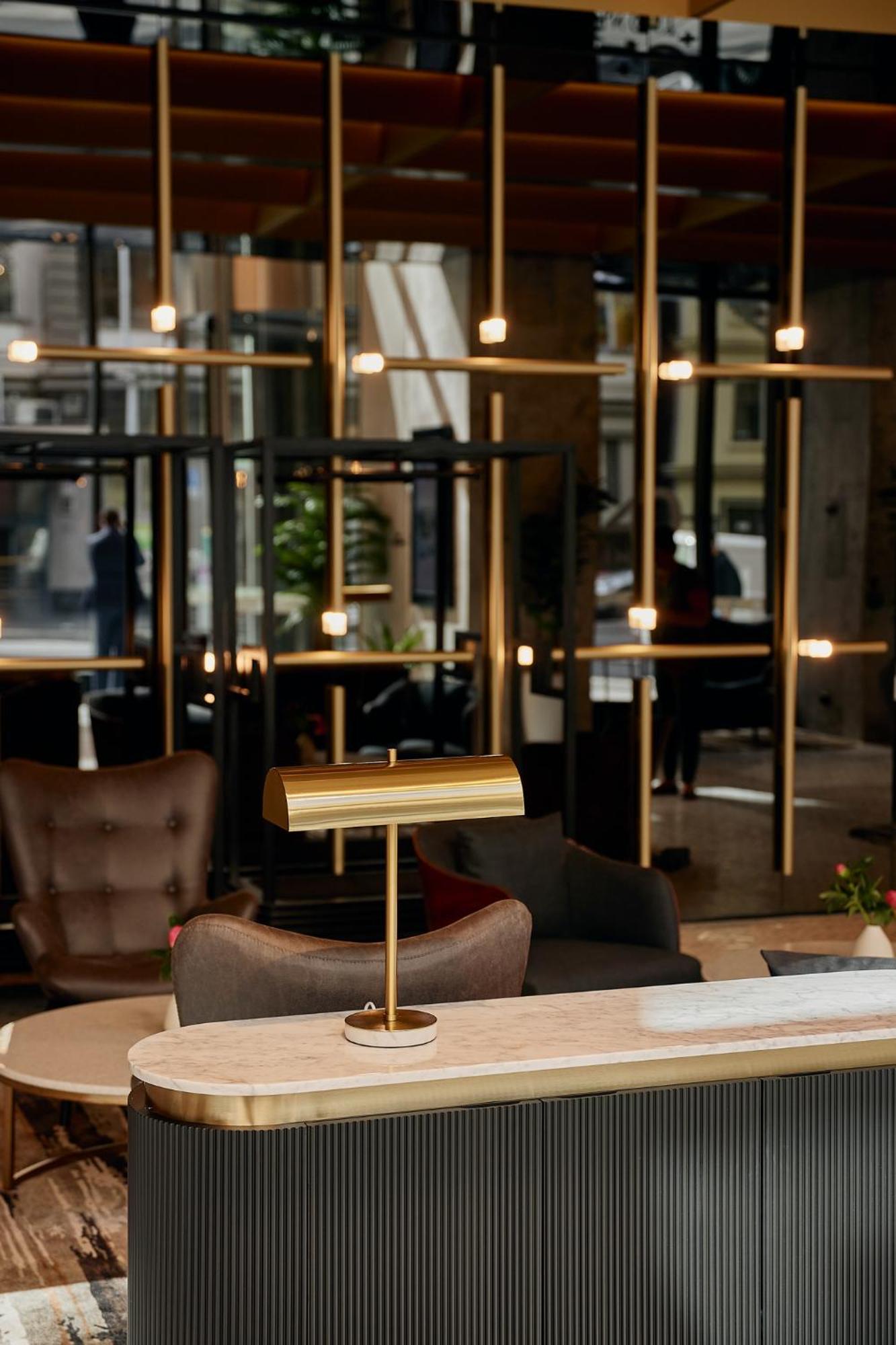 Meriton Suites Melbourne Exterior foto The interior of the lounge