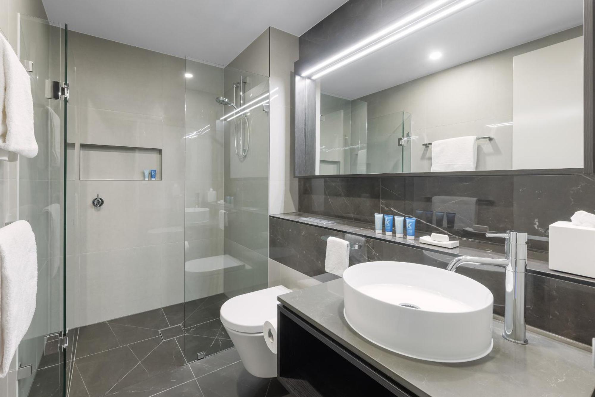 Meriton Suites Melbourne Exterior foto A modern bathroom